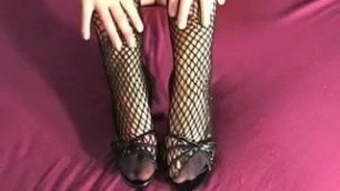 in fishnets she is horny to fuck the heel