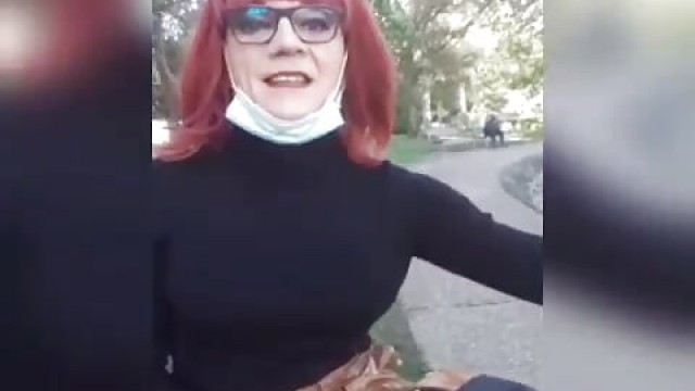 sissy slut in bourgeois outfit at the public garden