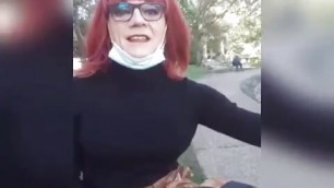 sissy slut in bourgeois outfit at the public garden